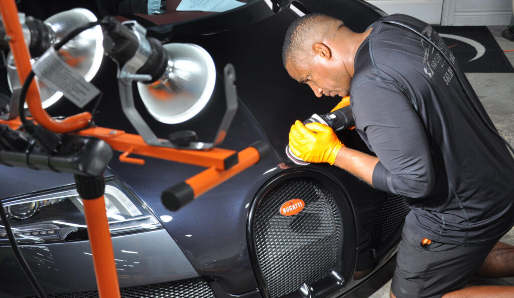 Charles Paint Correcting a Bugatti